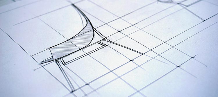 Bachelor Produktdesign Das Bild zeigt die Zeichnung und Planung eines Produktes. Zu sehen ist ein Auschnitt der Zeichnung auf Papier und durch klare Linien strukturiert.